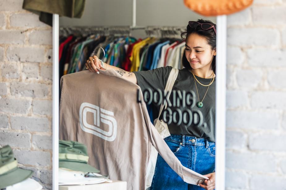 woman shopping in thrift store