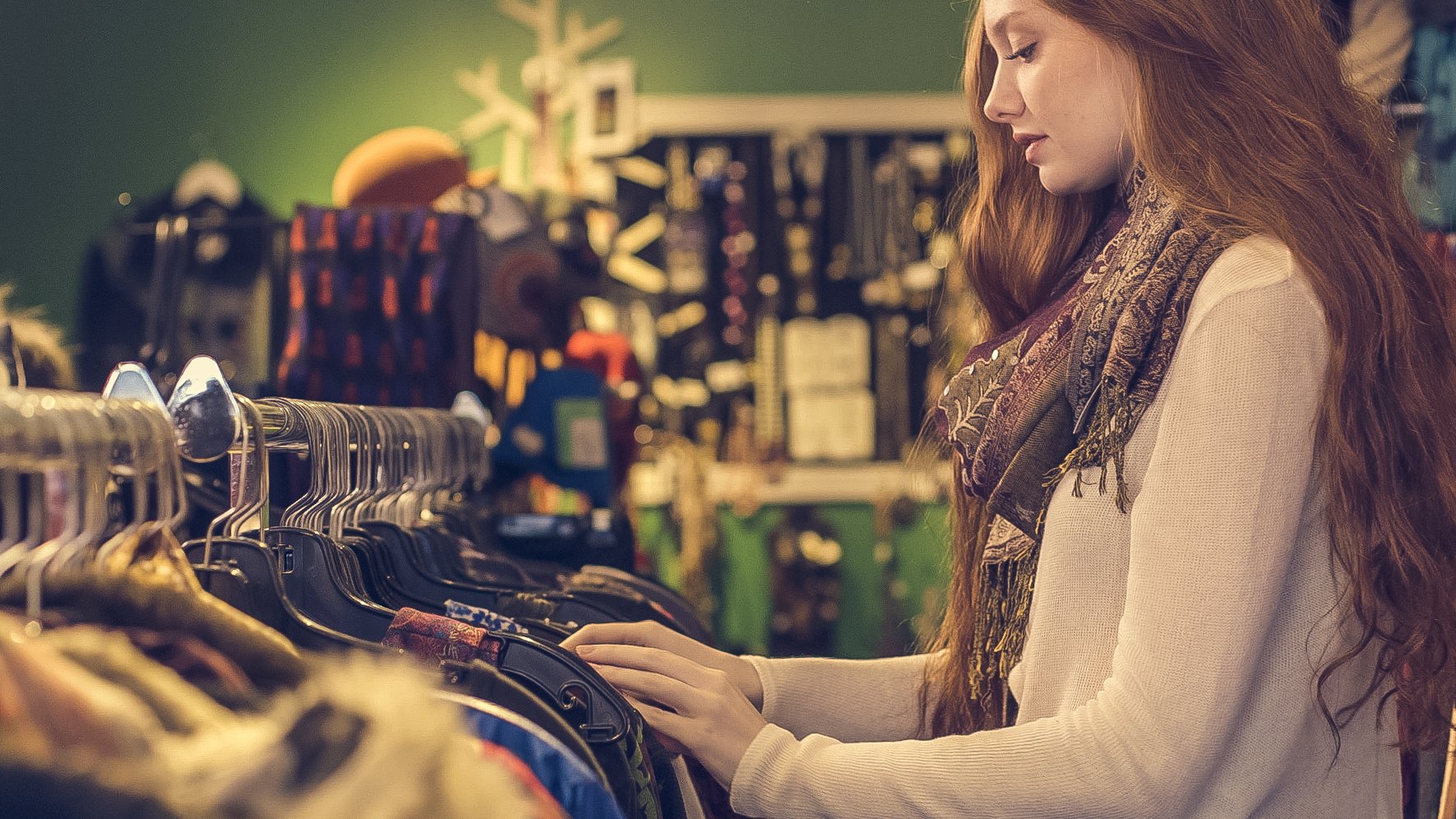 woman shopping in a thrift store