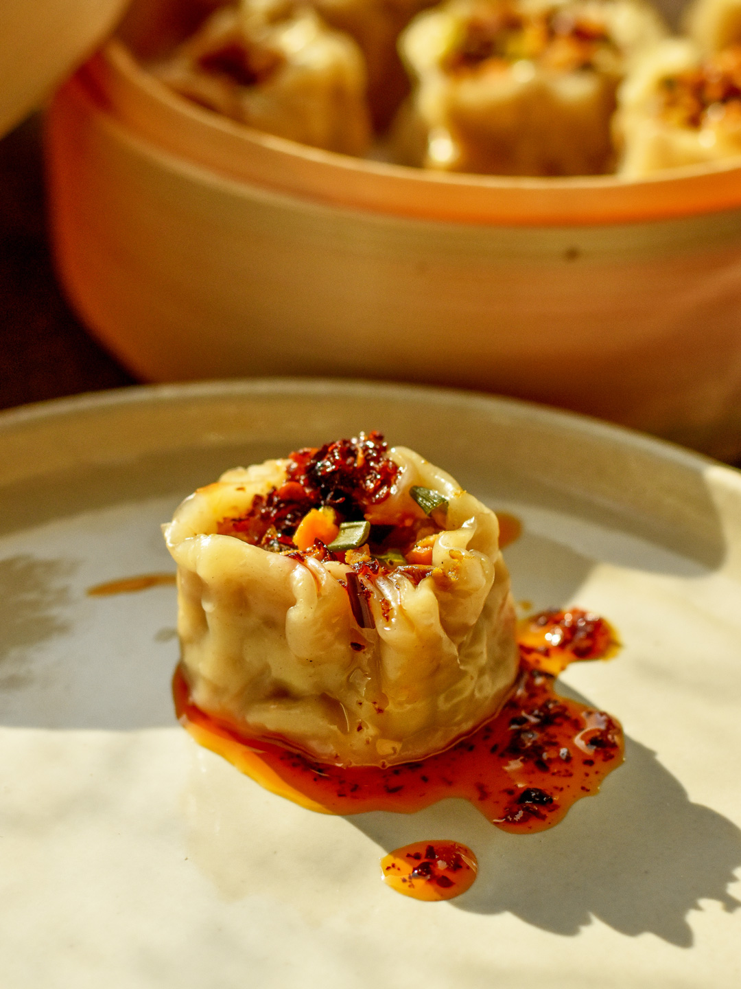 steamed vegan filipino siomai with garlic chilli oil