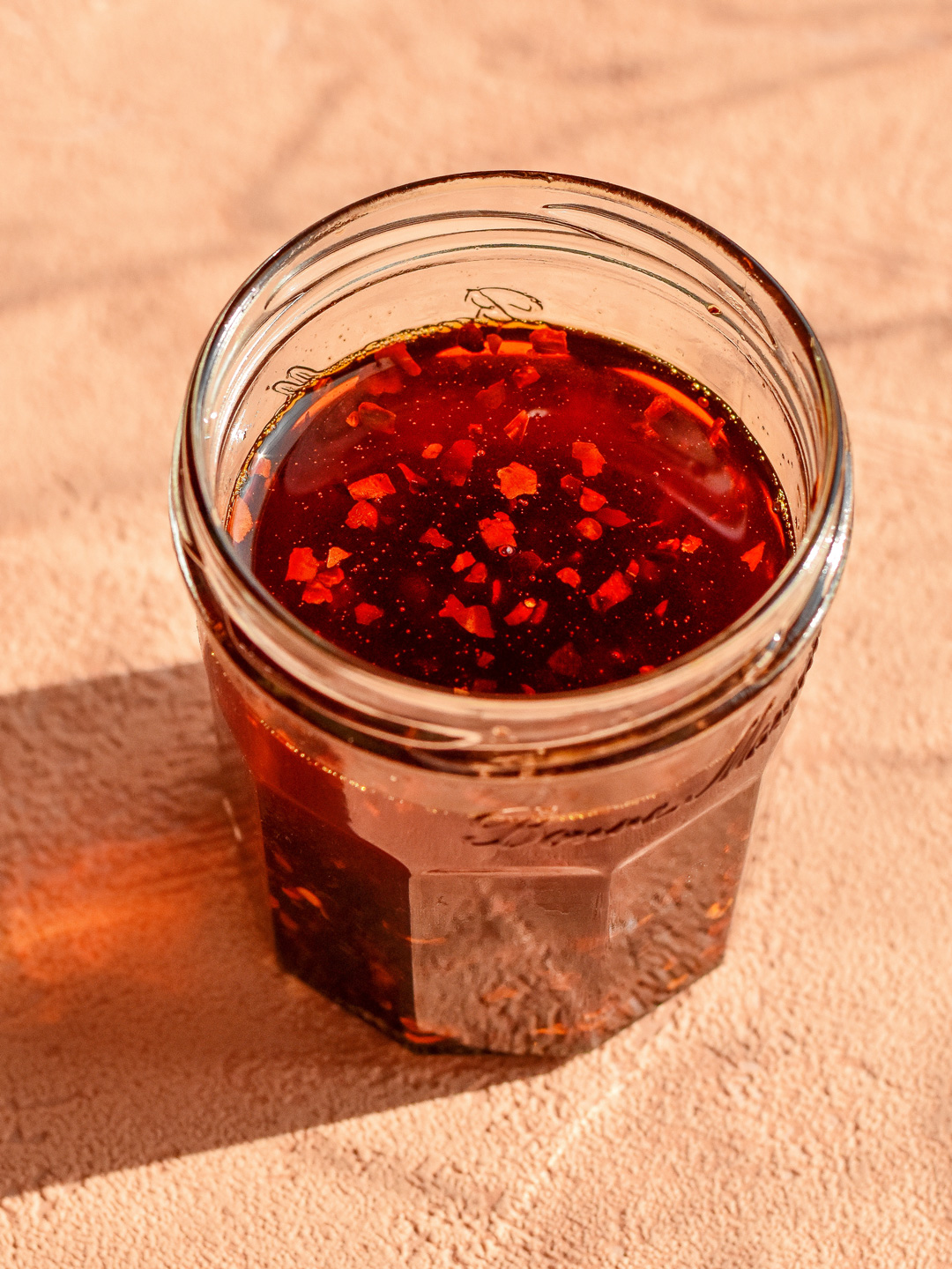 garlic chilli oil served in a glass jar