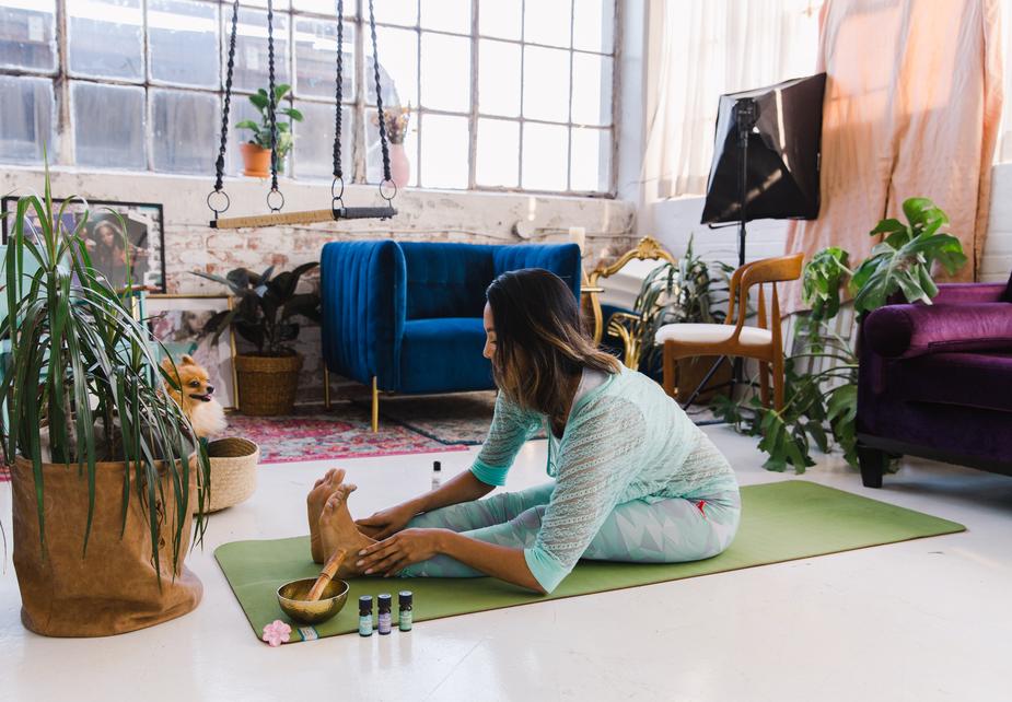 woman practising yoga at home