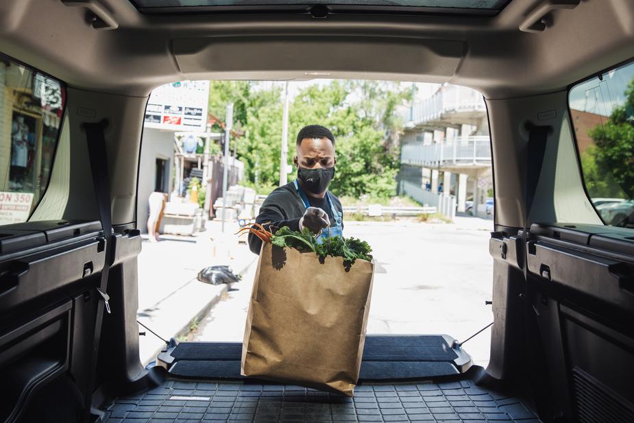 delivery driver with groceries 