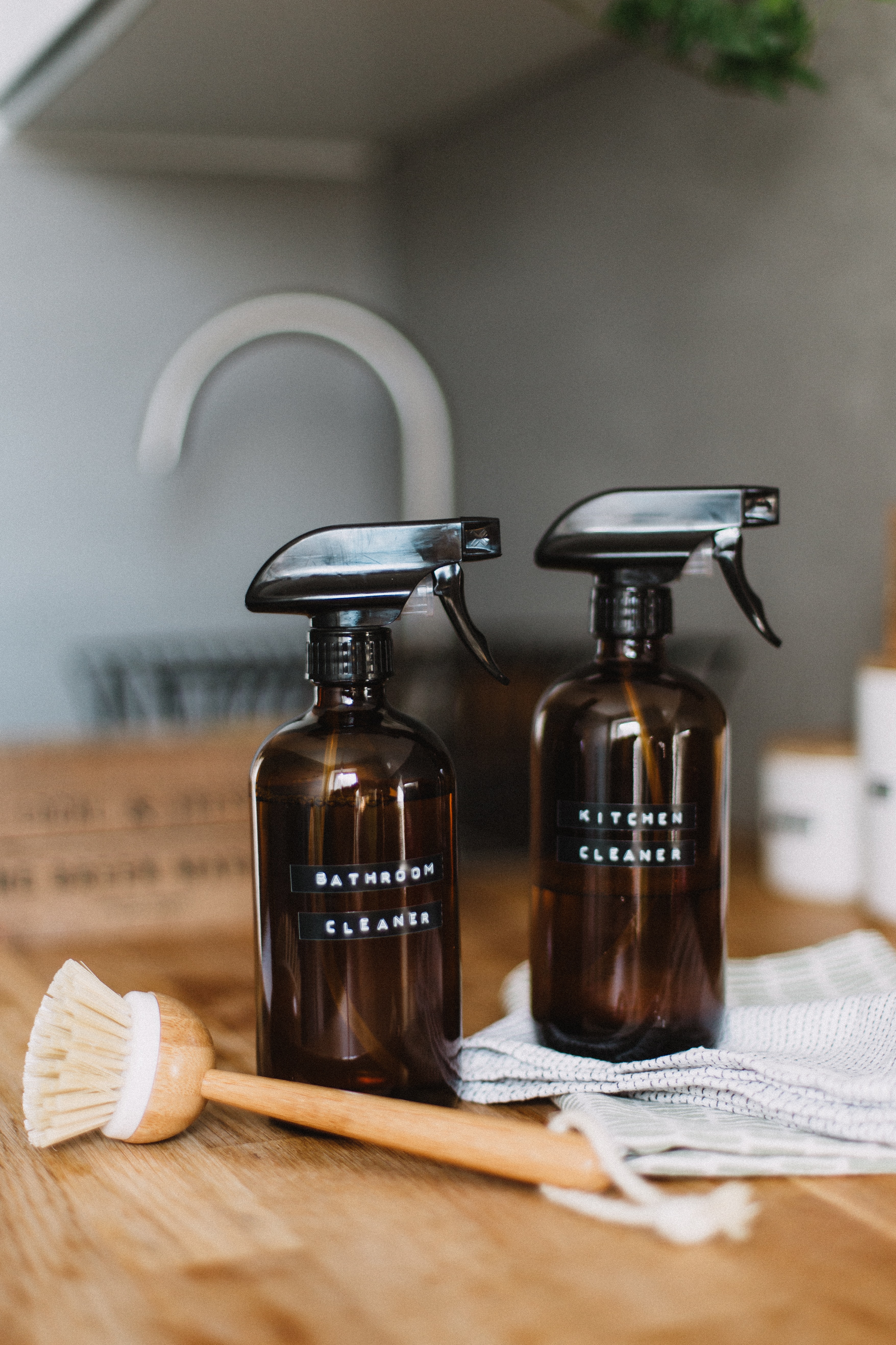 cleaning products by sink