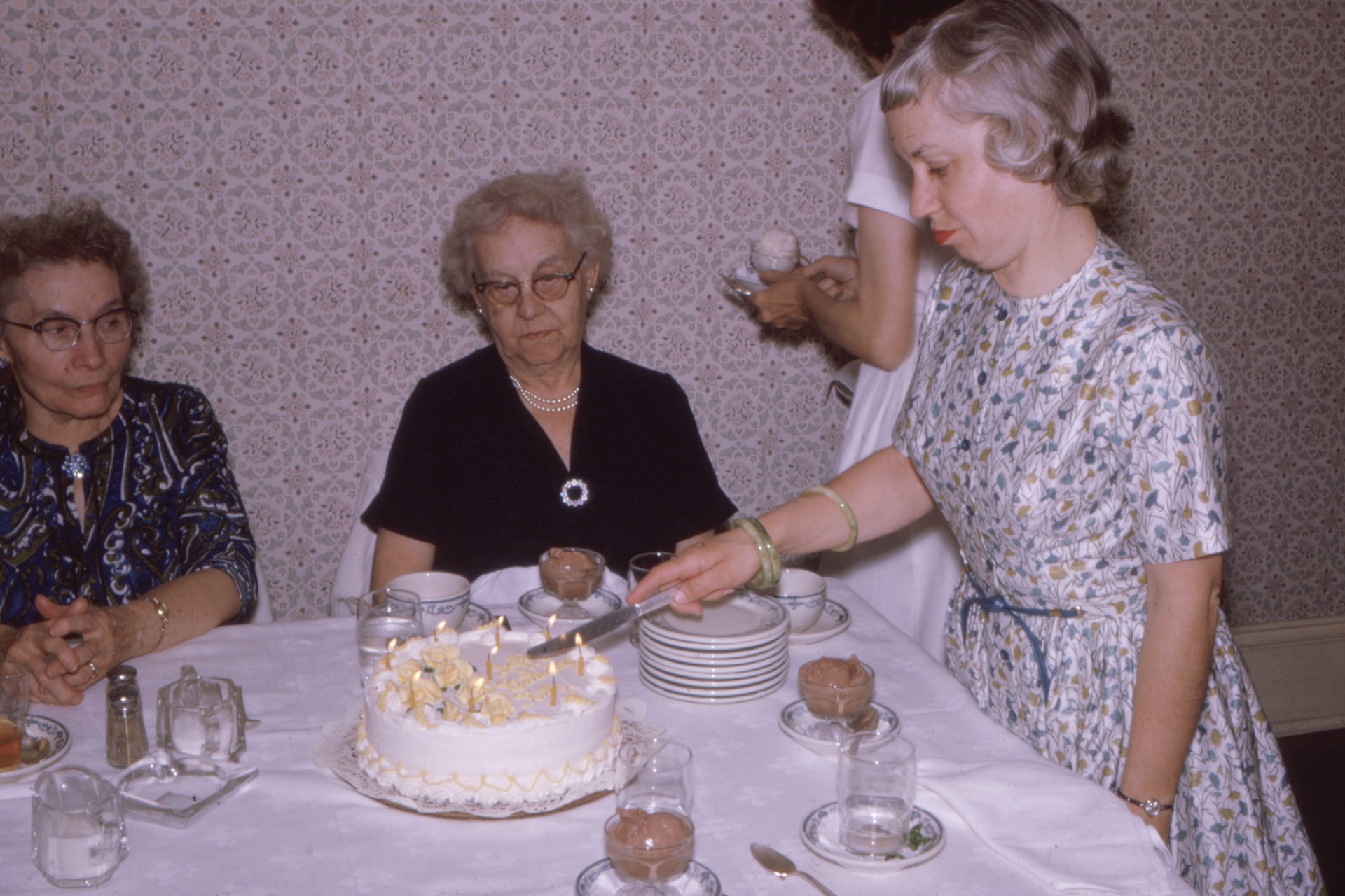 vintage photo of family with birthday cake