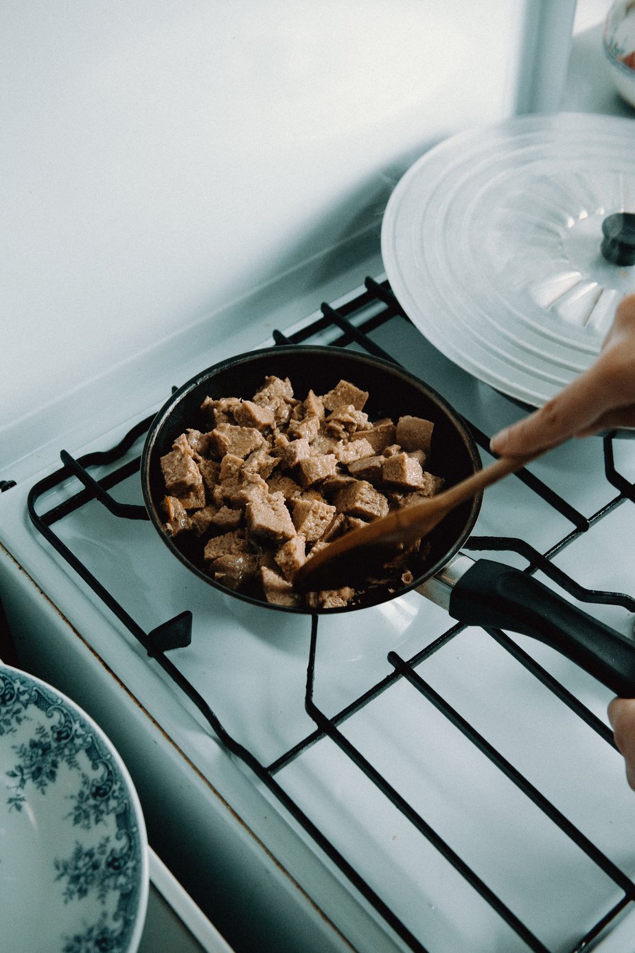 mixing plant-based meat on the stove