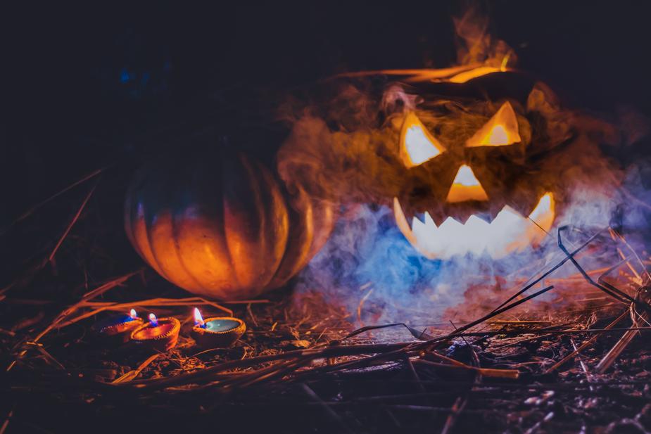 spooky pumpkins with light and smoke