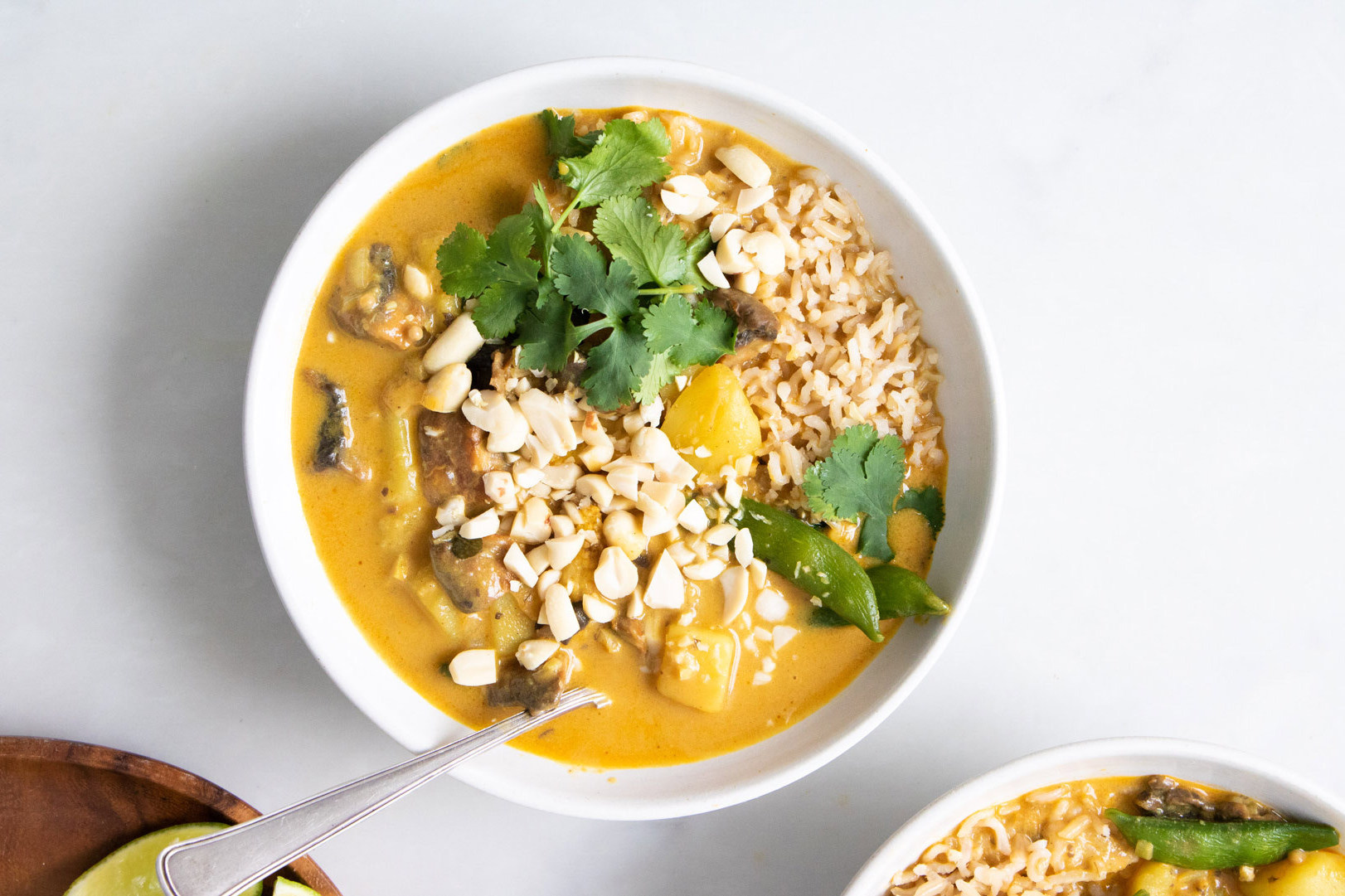 curry in white bowl with spoon