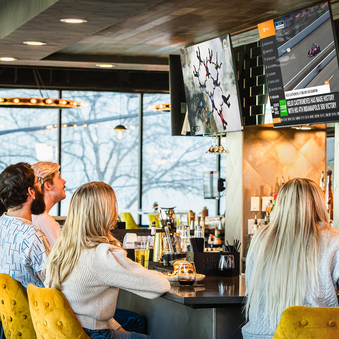 Restaurant Customers watching the Atmosphere Sports channel 