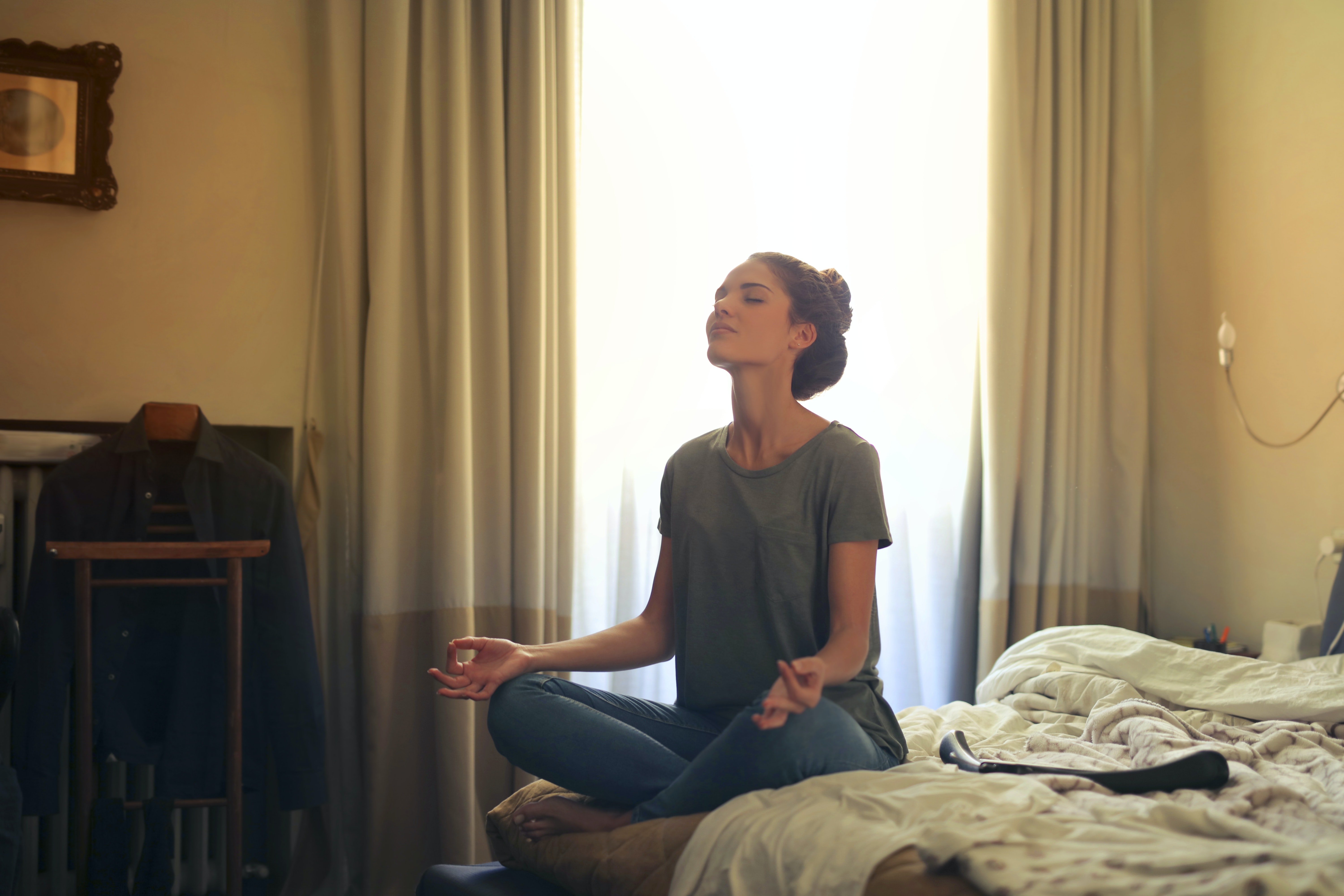 woman meditating at home