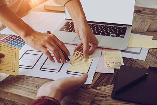 laptop with sticky notes