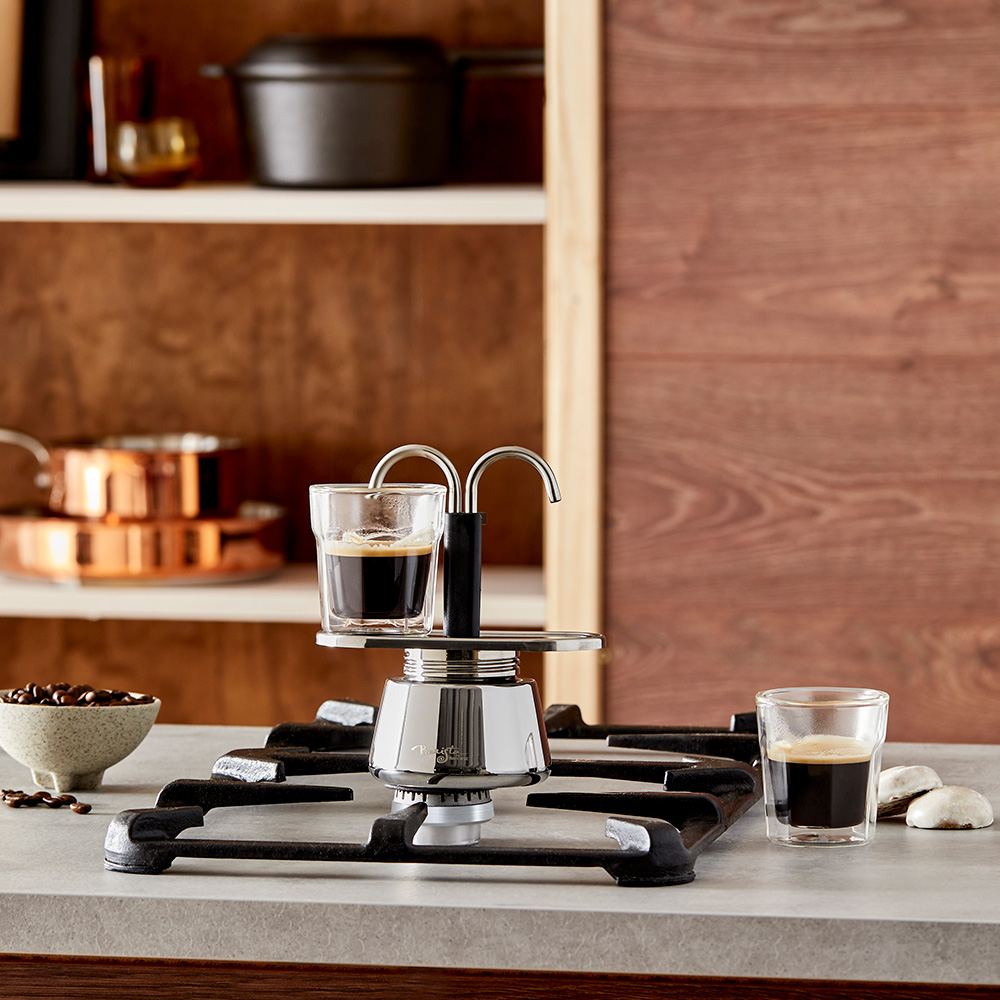 double espresso coffee maker on the stovetop brewing coffee. Father's day gift guide. The Caffeine Lover