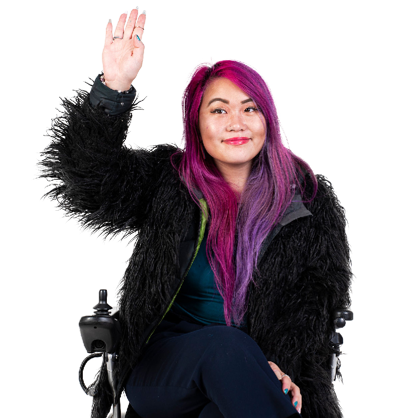 A person with their hand in the air.