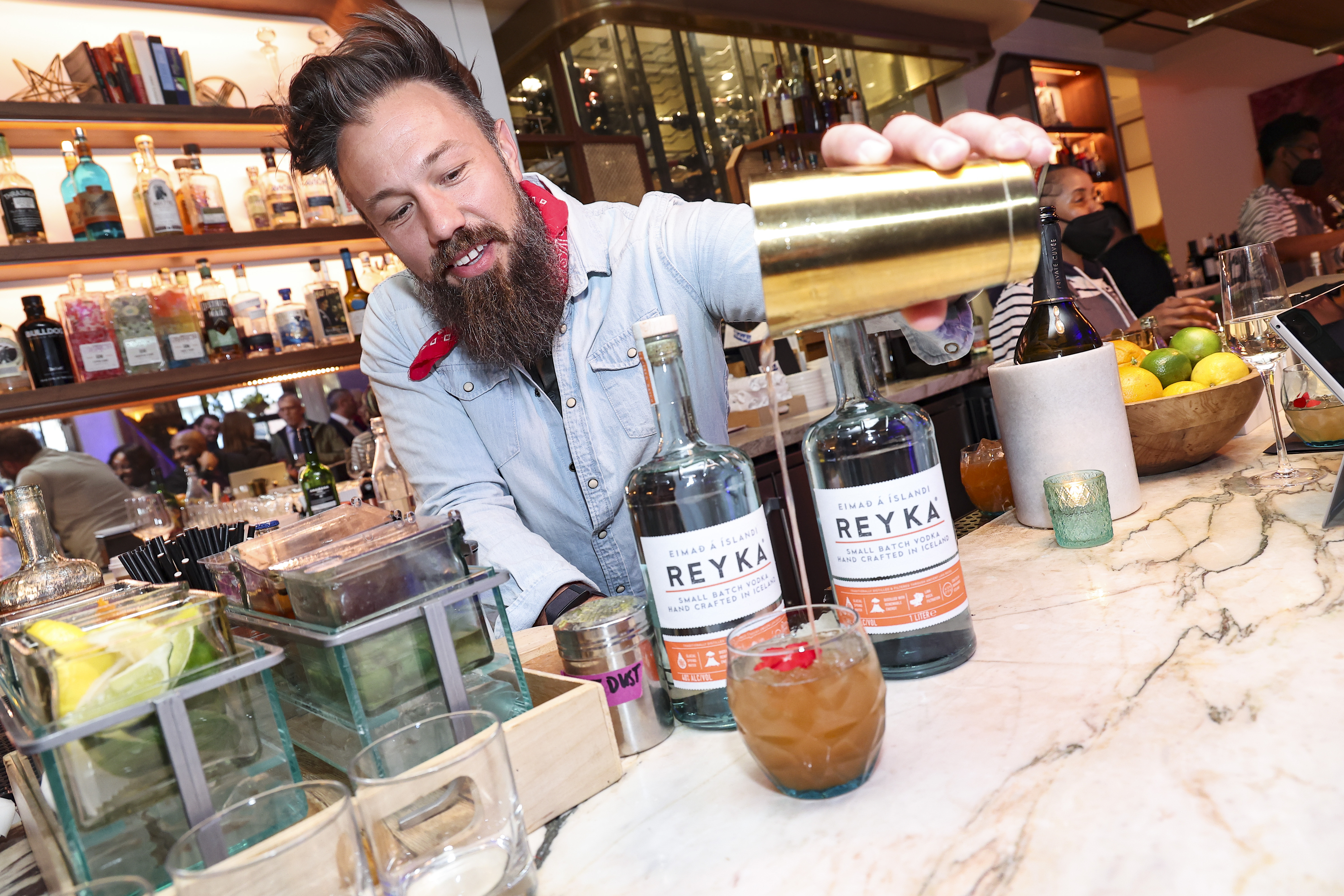 Jeffrey Naples, Reyka Vodka Ambassador, at a Cocktail Class in Washington DC mixing drinks. 