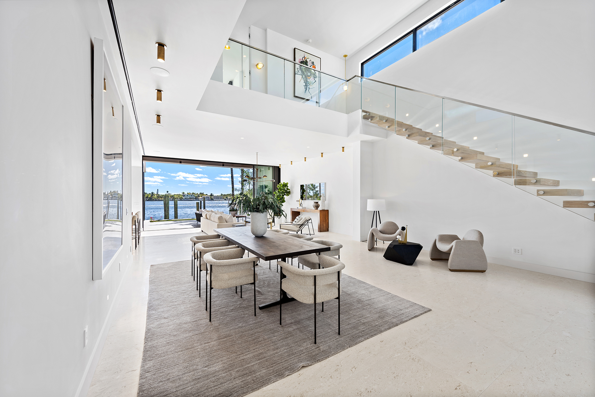 Meridith-Baer-Home-Home-Staging-Florida-Stillwater-Serenity-Luxury-Homes-Modern-and-Contemporary-Dining-Table