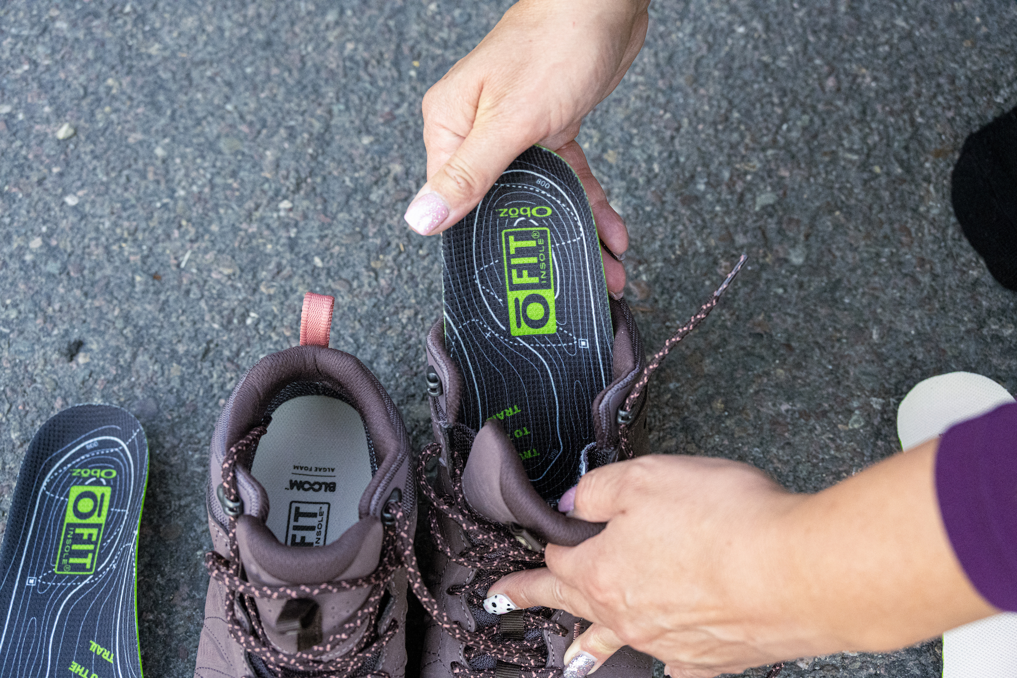 O Fit Insole Plus II being inserted into the Oboz Sypes hiking shoe 