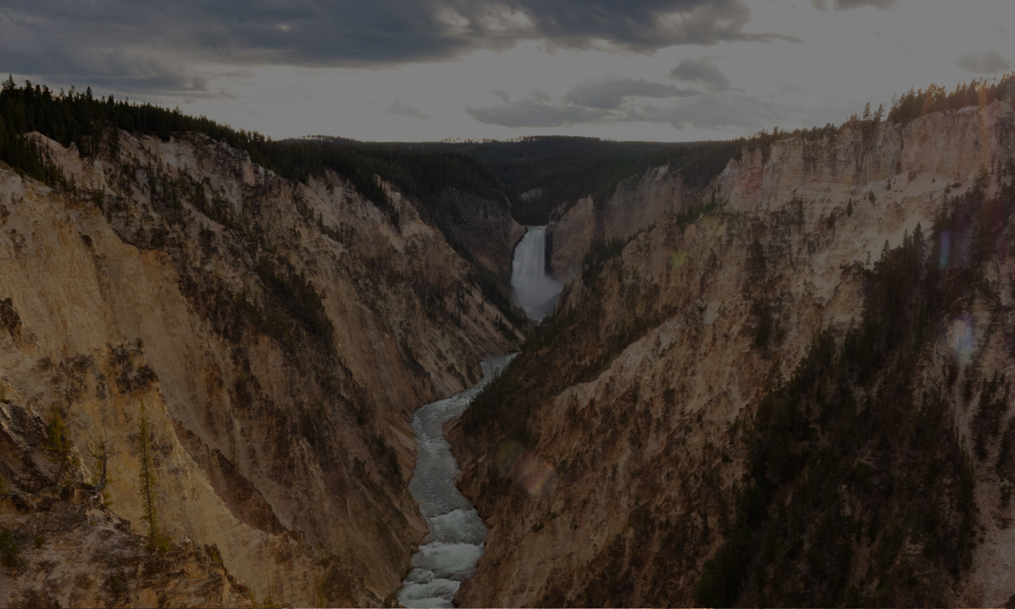 Powerful river water flowing in the Lower Falls of the Yellowstone National Park.