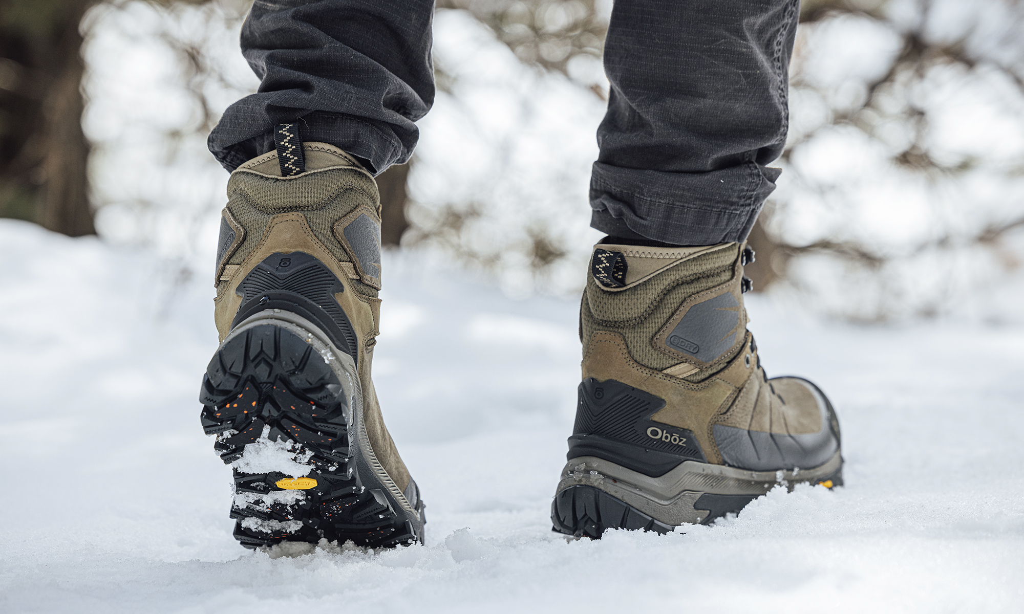 Oboz Bangtail Insulated Winter Boots in the snow.