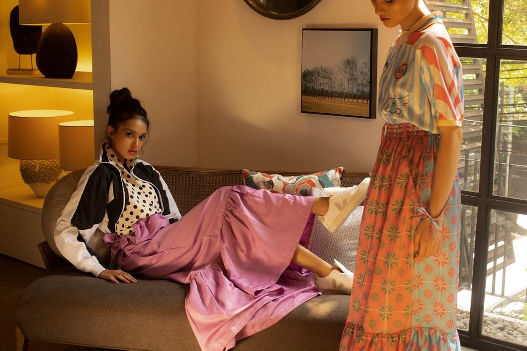 Two young girls dressed in bright colors from MASARISHOP. 
