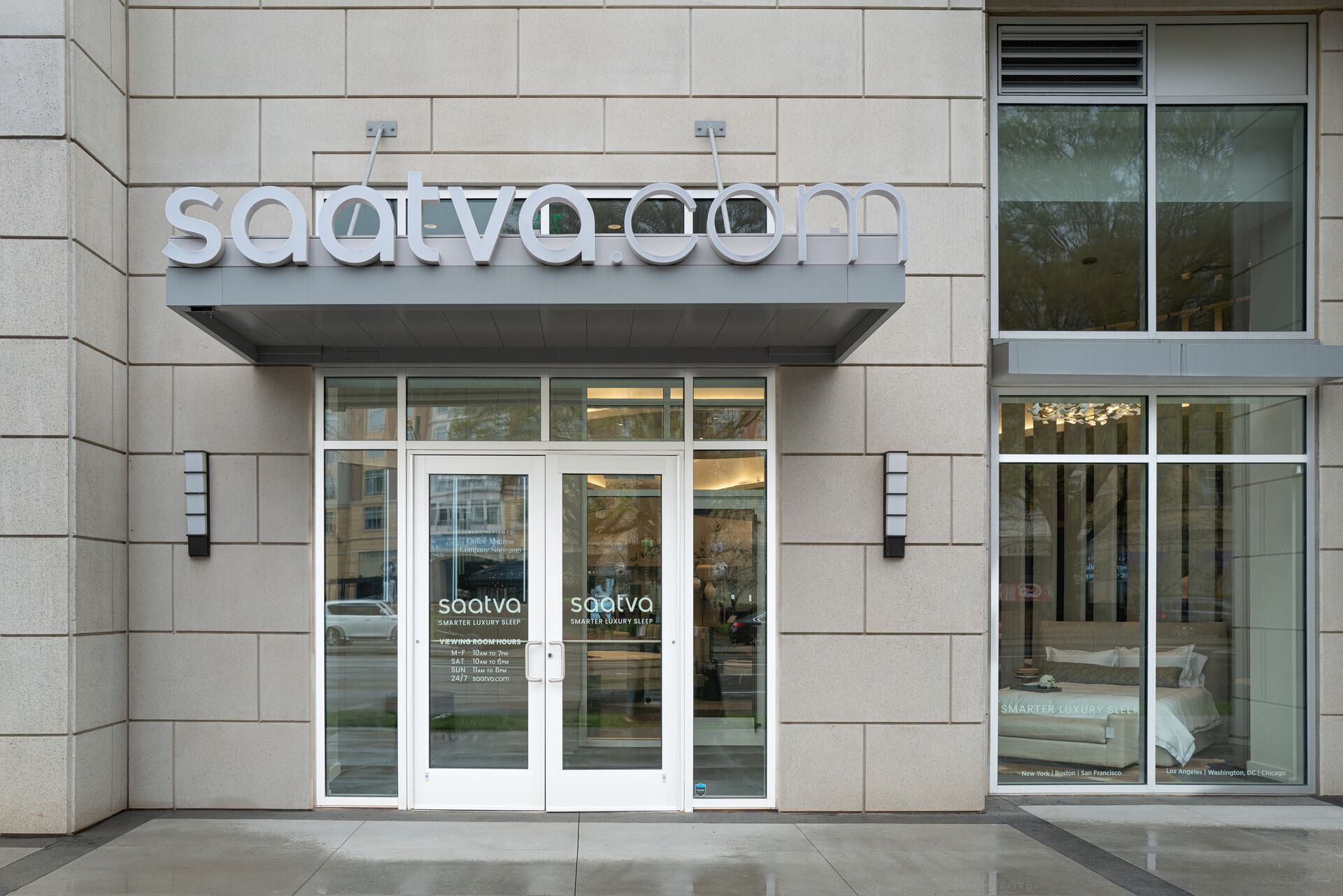 The modern, elegant facade of the Saatva Charlotte retail location.