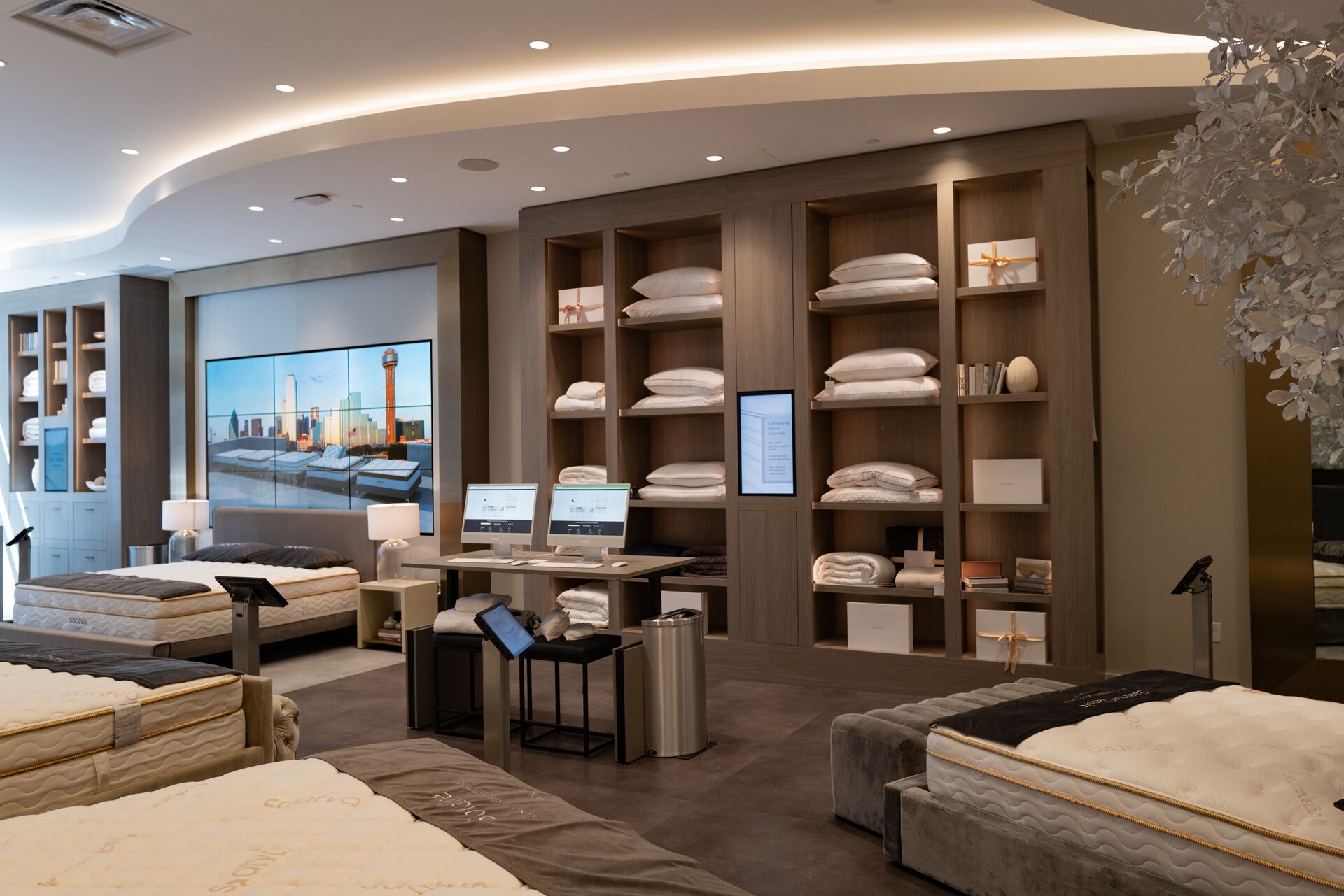 Saatva Dallas' digitally-supported bedding accessories area and self-checkout stations