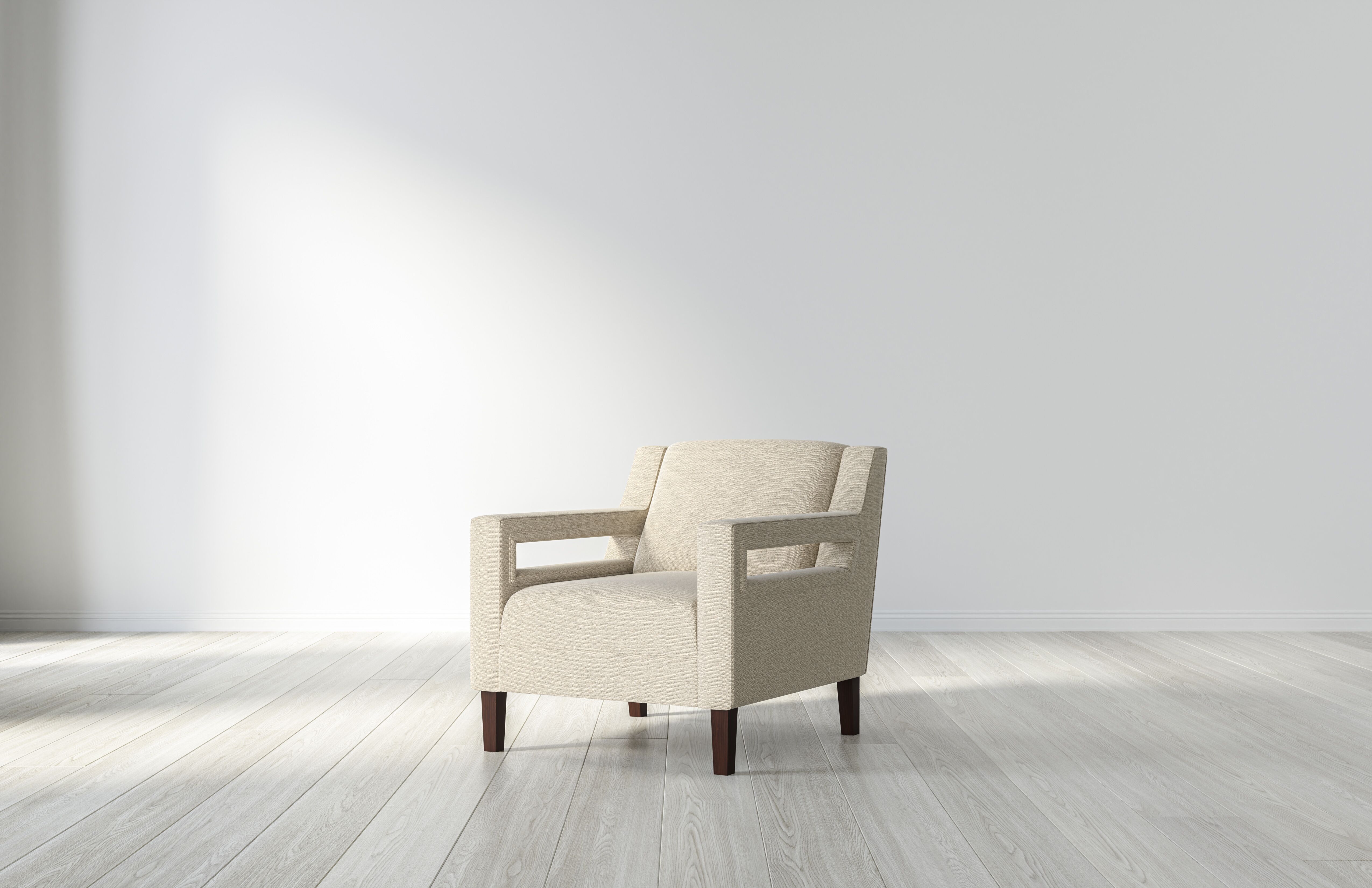 The Saatva Logan Armchair in Natural Linen - a mid-century style chair that exhudes modern elegance.