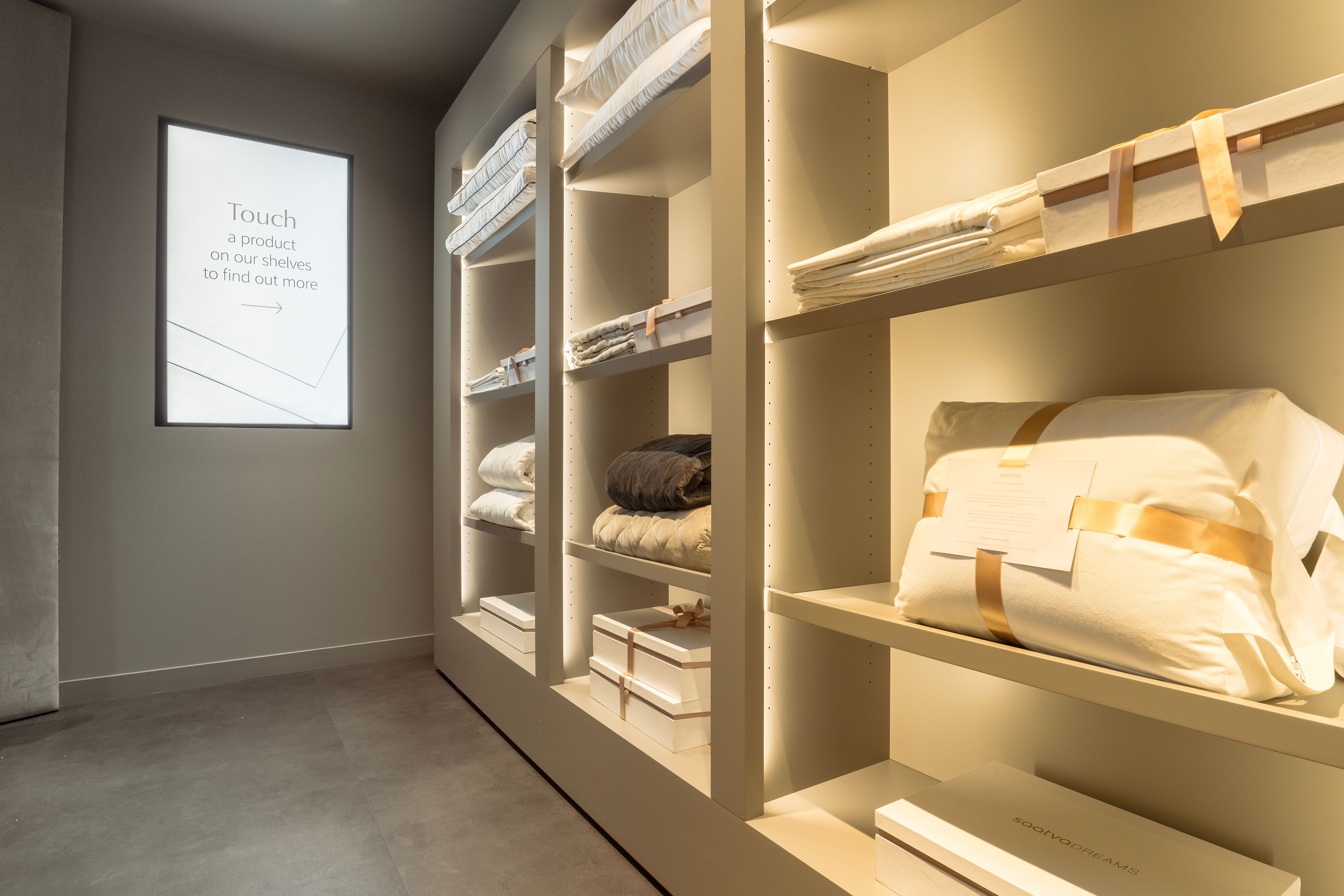 The Saatva New York Viewing Room touch-activated Bedding and Sleep Accessories Wall 
