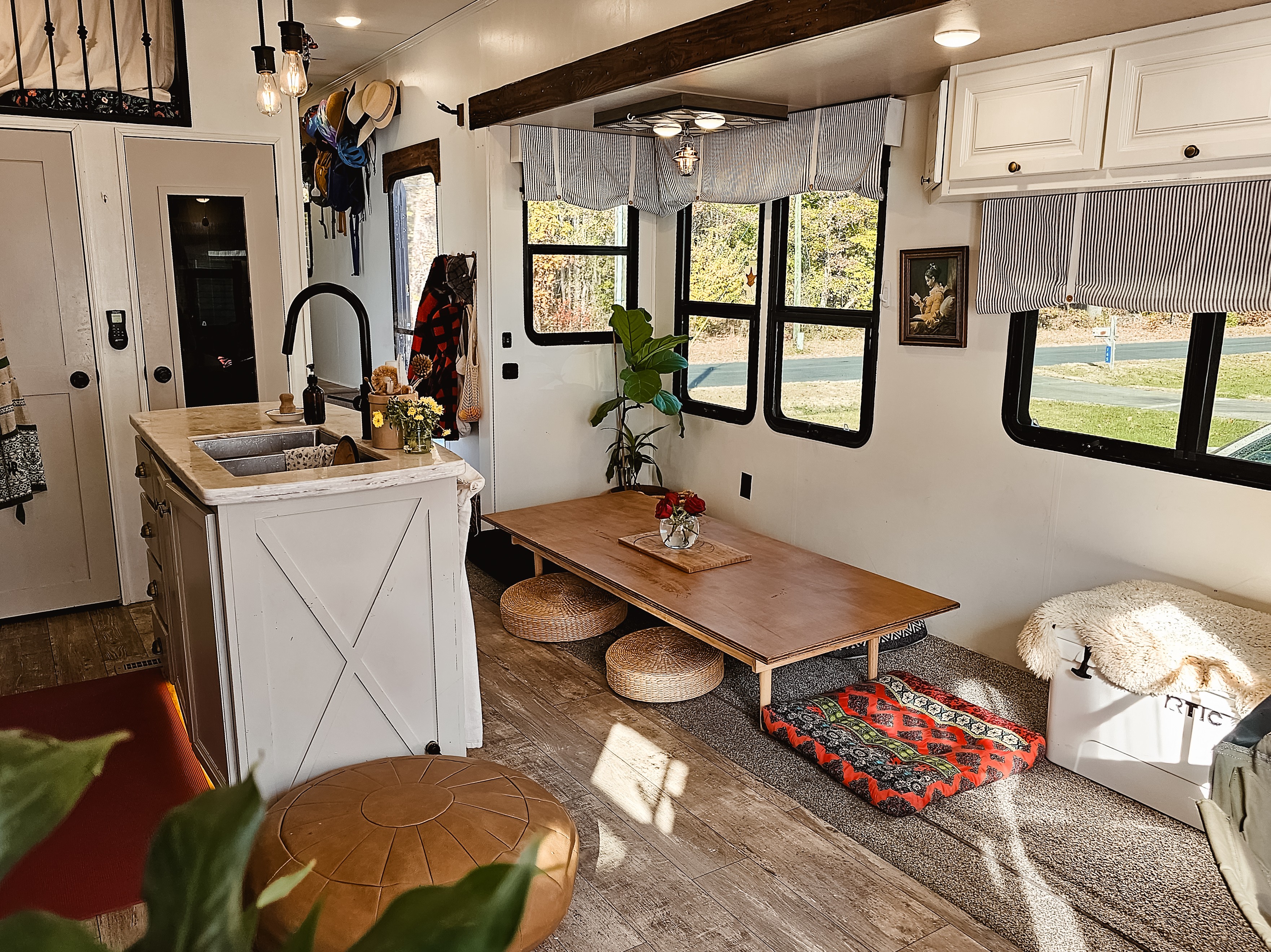 The kitchen and living room inside JC and Barbel (Bibi) Barringer's 2018 KZ Durango Gold fifth-wheel