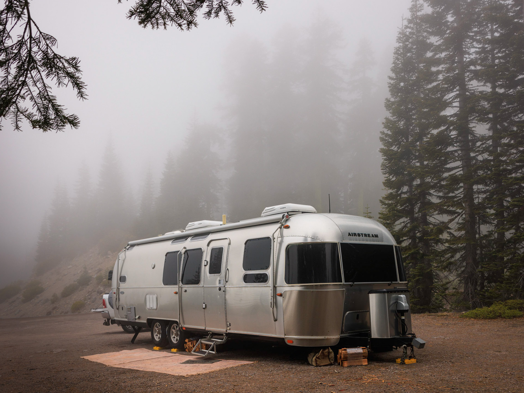 Karen Blue's Airstream in a foggy forest