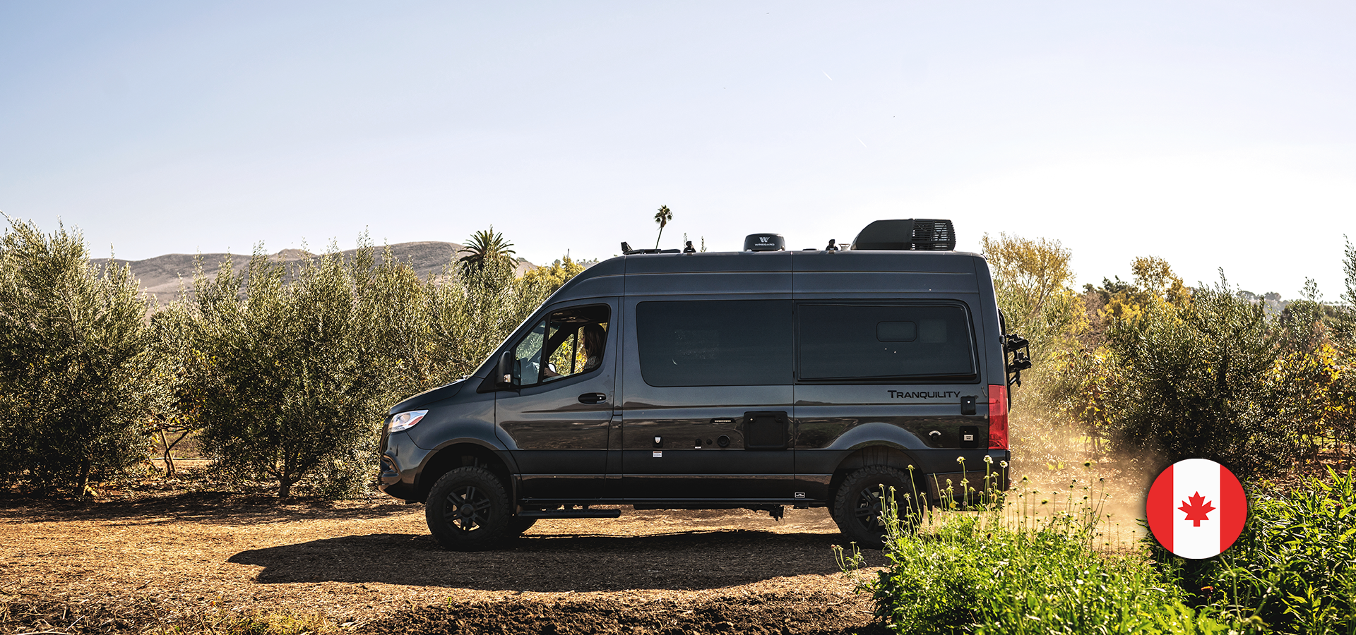Tranquility Sprinter in desert with canada flag emblem
