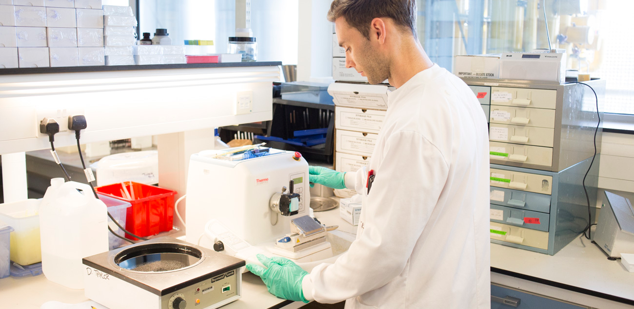 Lab researcher using equipment