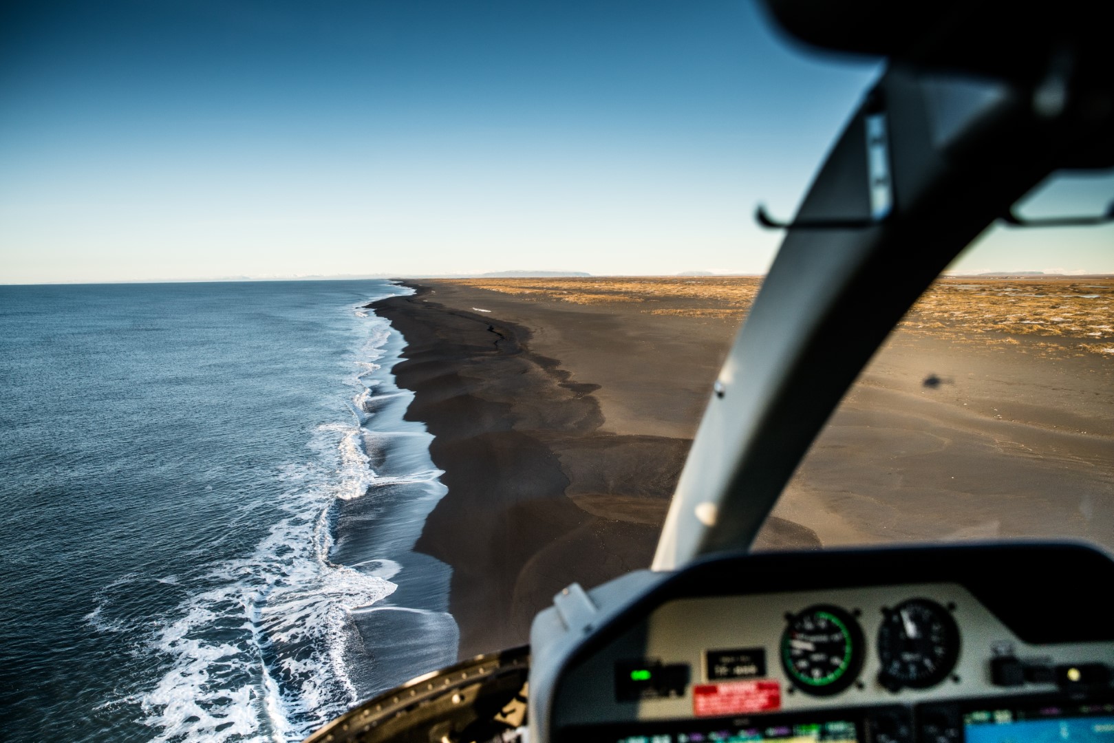 Helicopter flying along the South Coast of Iceland