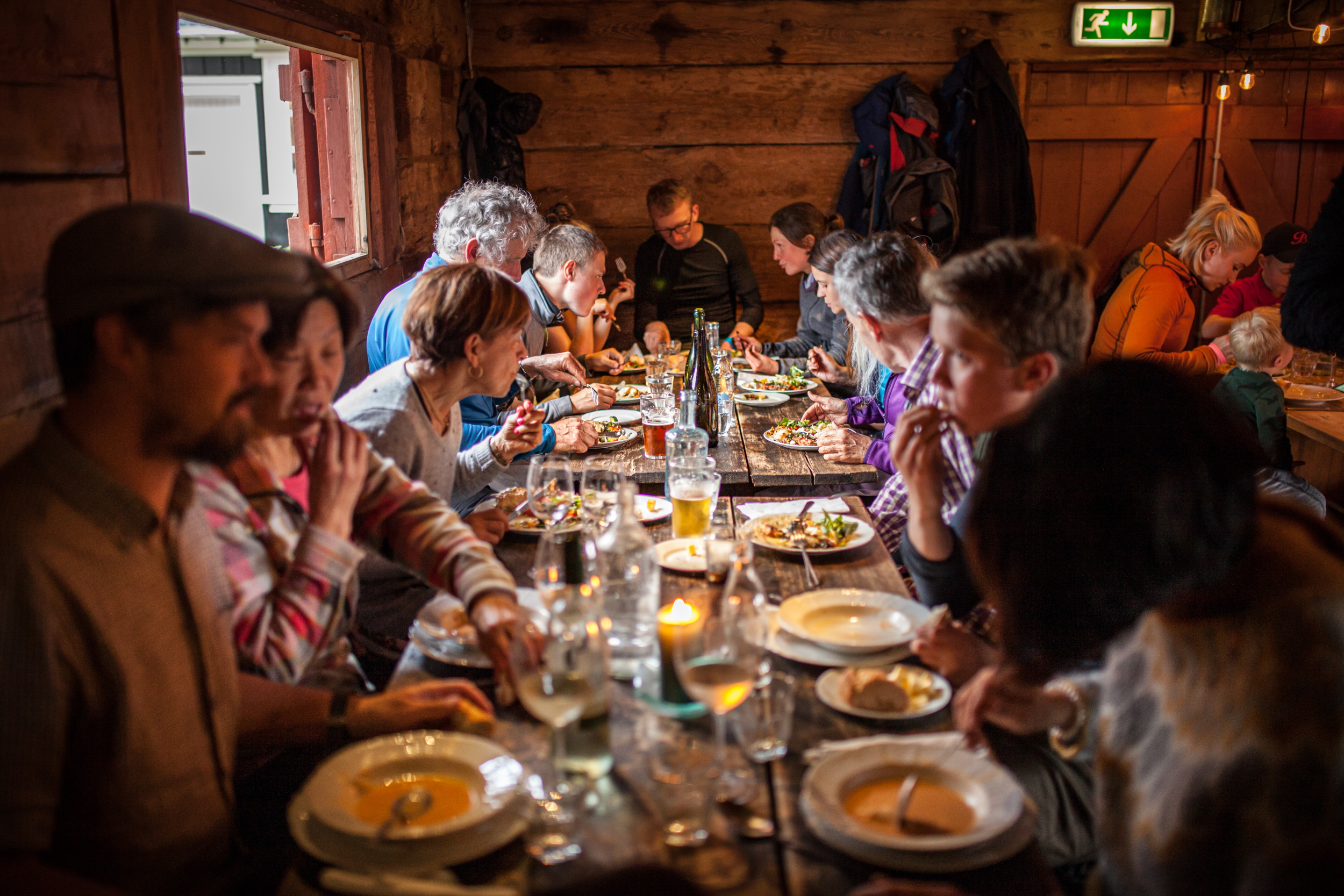 People dining at Tjöruhúsid restaurant in Ísafjördur