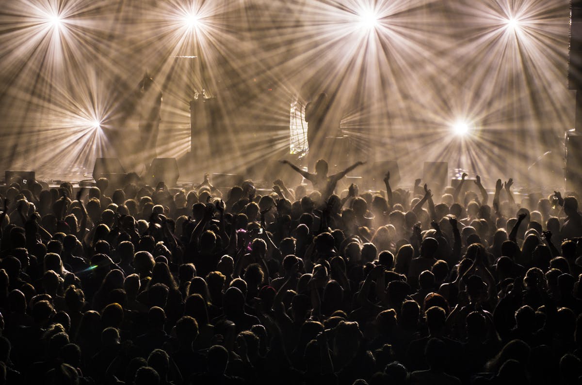 A full house of people at a rock concert