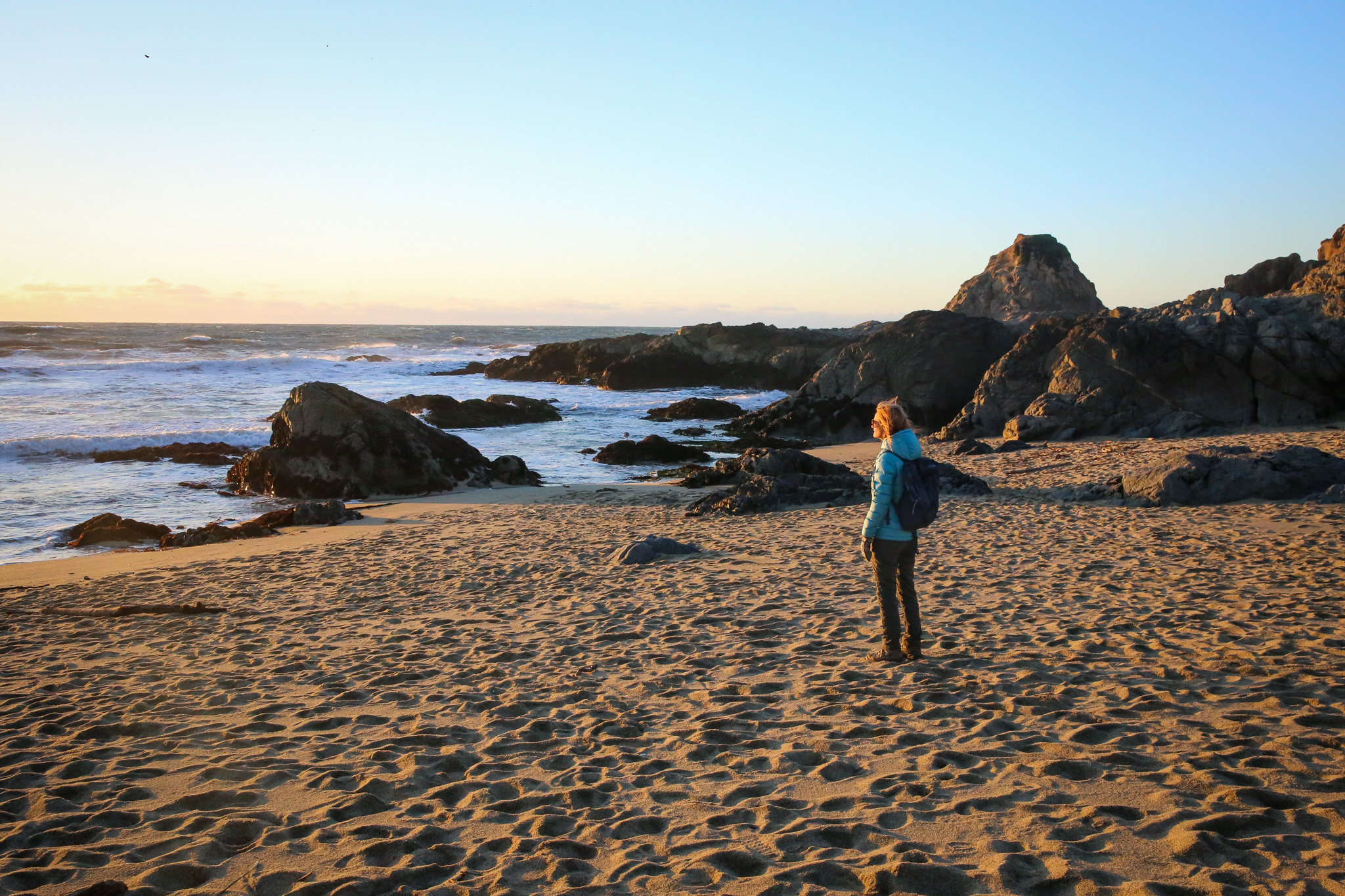 woman on the beach at Bodega Head