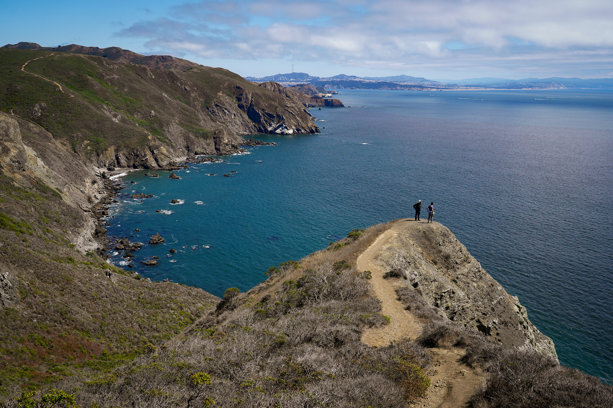 hikers on the Coastal Trail to Pirates Cove in Marin Headlands