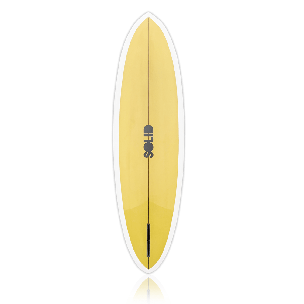 A yellow surfboard with the SOLID logo in the middle.